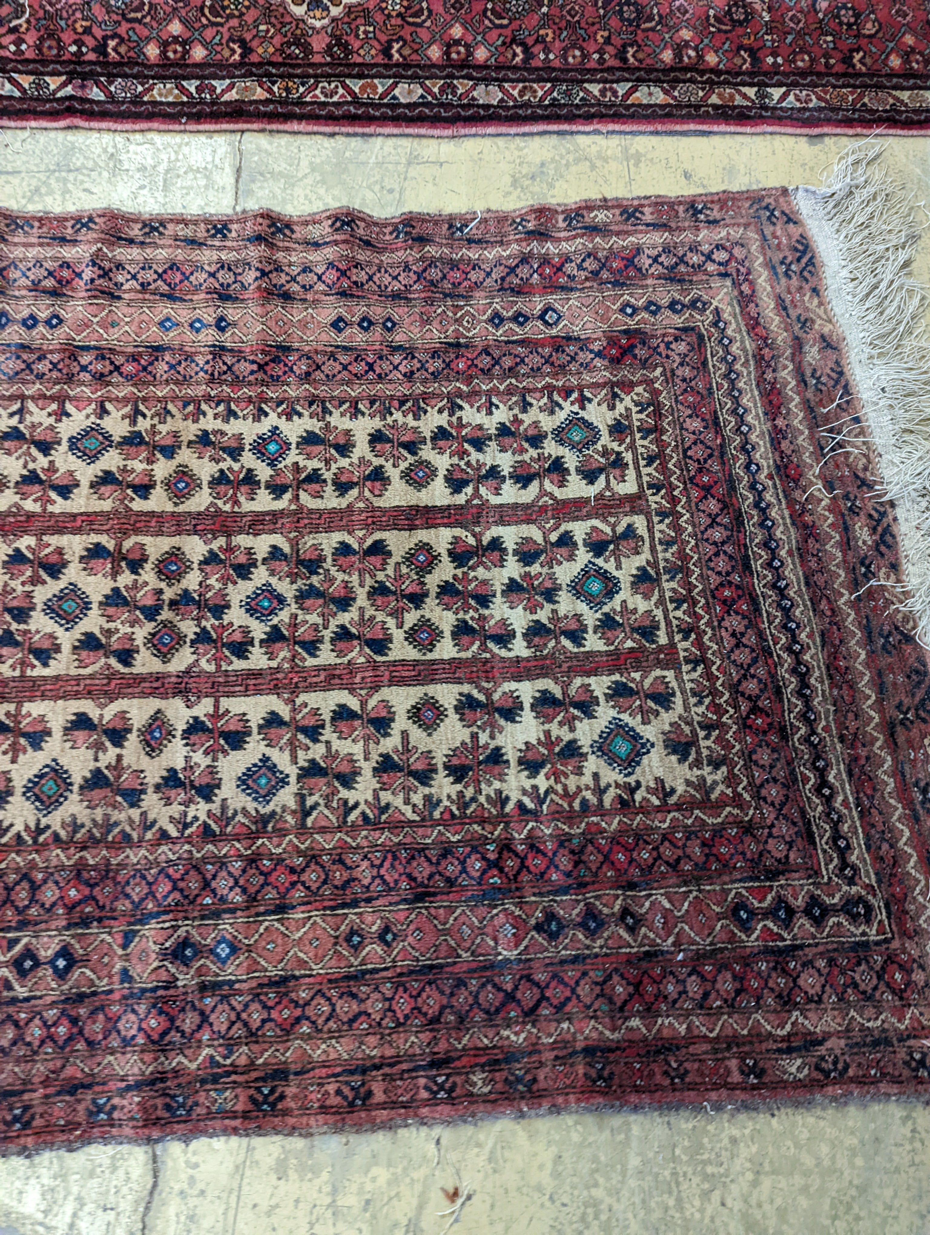 An antique Caucasian runner and a Belouch rug, larger 284 x 134cm